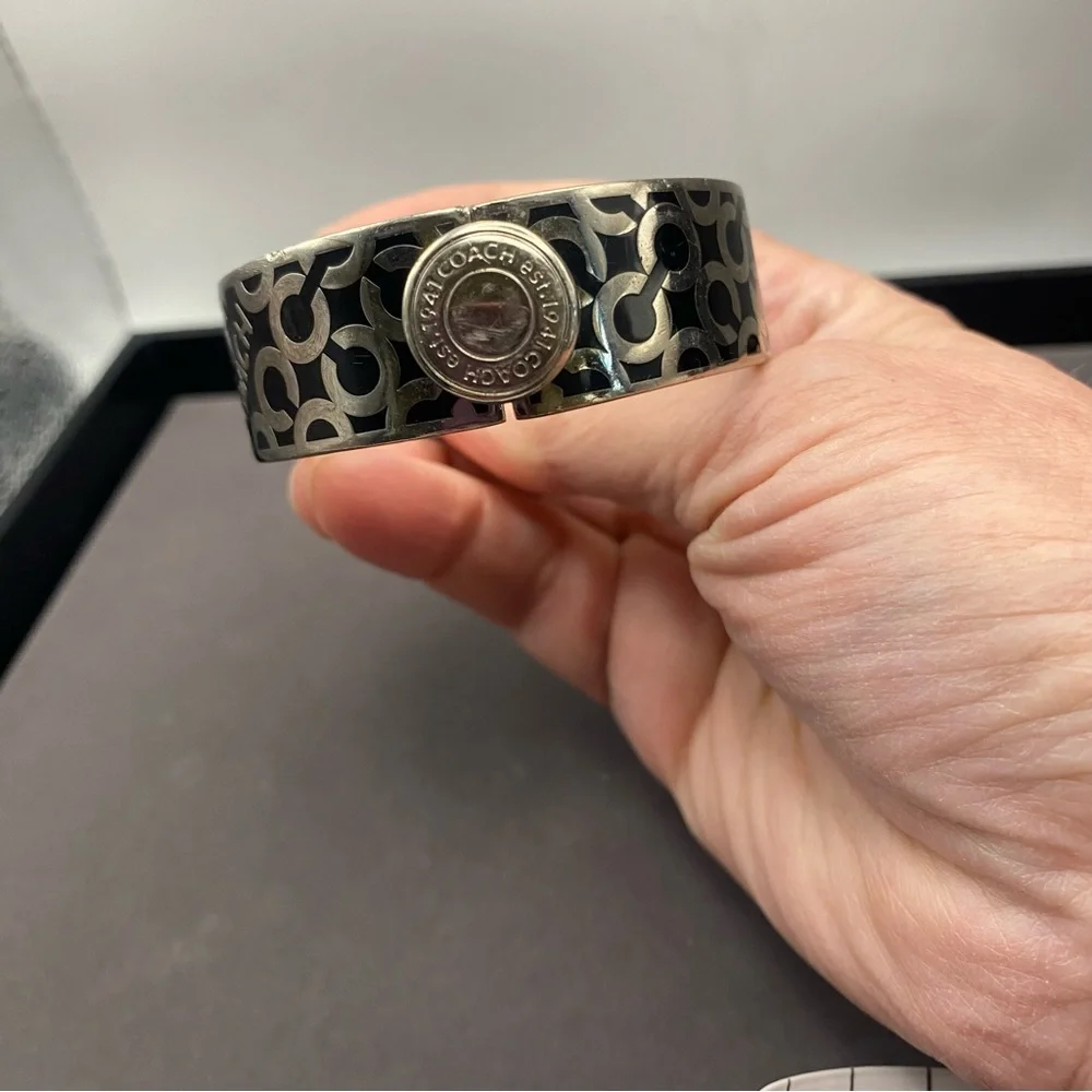 Coach Silver-Tone Black Logo Hinged Bangle Bracelet